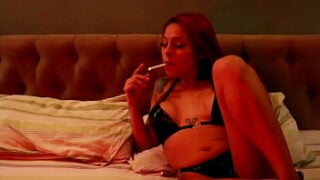 Redhead Smokes Her Cigarette And Fucks A Gifted Man